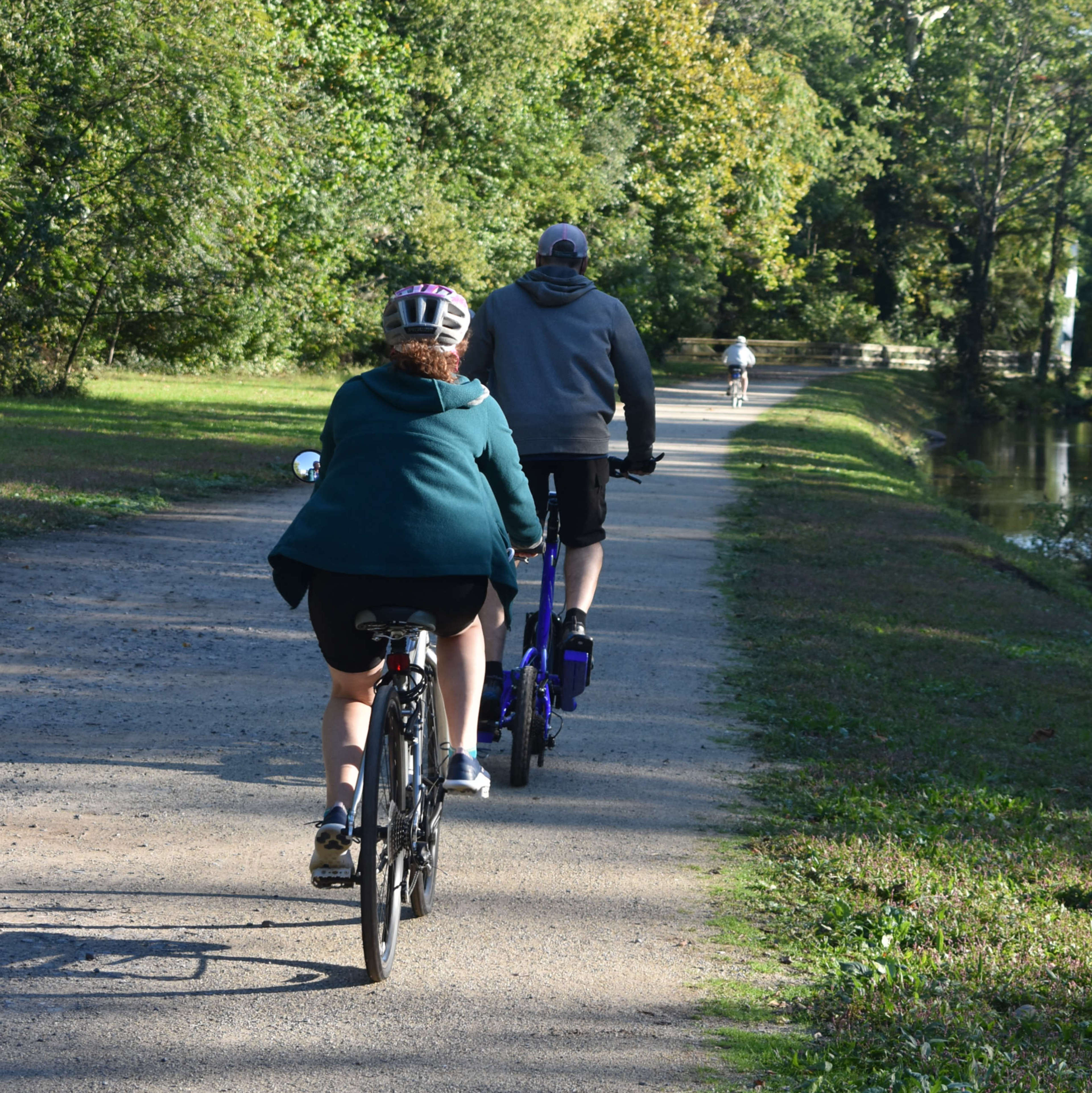 two people riding bicycle